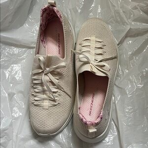 Skechers Women's Cream Knit Slip-On Sneakers with Pink Lining